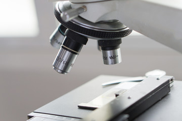 medical laboratory, scientist hands using microscope for chemistry test samples,examining samples and liquid,Medical equipment. microscope,Scientific and healthcare research background.vintage color