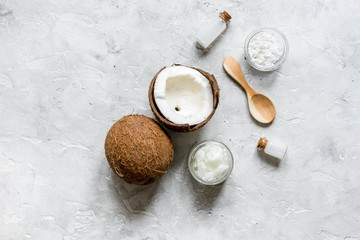 coconut oil for body care in cosmetic concept on stone desk