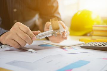 architect work concept.man working with new startup project in modern loft. Drawning pen,inspection...