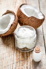 organic cosmetics concept with coconut on table background