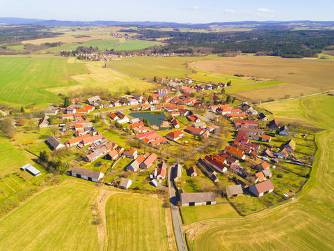 Aerial view of beautiful village in spring countryside. Old village Lipnice in Brdy, Czech republic. Rundling is a form of circular village. Typical medieval settlement.