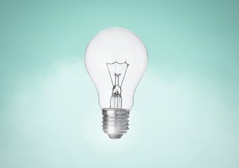 Light bulb against turqouise background