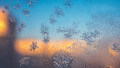 wonderful winter patterns on glass at sunset.