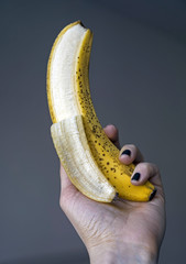 Holding banana