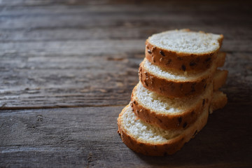 sliced ​​bread on wood background