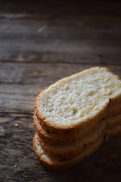 sliced ​​bread on wood background