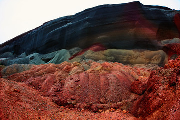 Quarry in a volcano crater in Iceland. Stone rock red and black