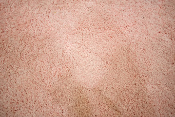 Closeup of seamless pink fabric texture background