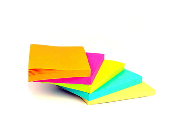 Pile of Sticky colored notes isolated on white background