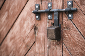The old door locked with a padlock hanging brackets. Set of backgrounds