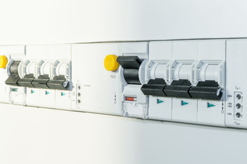 A number of automatic switches and differential circuit breakers with led indication of the module...