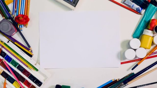 Designer make blank place for your title on the artist workspace. Hands remove objects on the table, leave blank area. 4K.