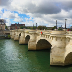 Obraz premium Pont Neuf Paris oldest standing bridge, built 1578, Seine River, locks, Notre Dame, Tour Eiffel views, Paris Olympics, France, bucket list, iconic, travel destination, Europe