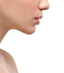 Obraz premium Face of young woman on white background