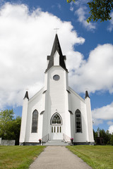 Fototapeta na wymiar Country Church against a summer sky