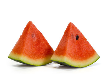 Sliced ripe red watermelon isolated on white background. File contains a clipping path.