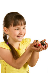 little girl and Easter eggs