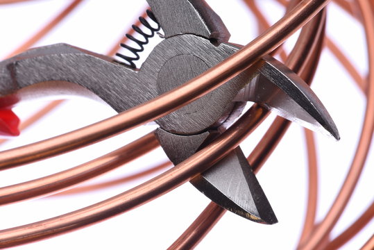 Copper wire and cutting tool close up