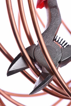 Copper wire and cutting tool close up