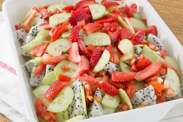 Ceramic Tray with Delicious Fresh Fruits Salad