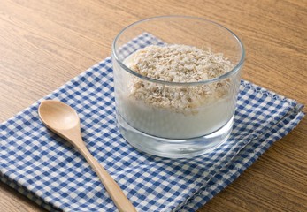 Yoghurt with Porridge Oats in Glass Cup