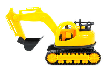 Bulldozer toy isolated on white background.Yellow bulldozer toy isolated © phanasitti