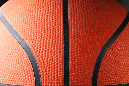 Old and dirty basketball represent the sport equipment concept related idea.