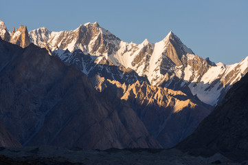 Karakorum snow mountain peaks at sunset, K2 trek, Pakistan