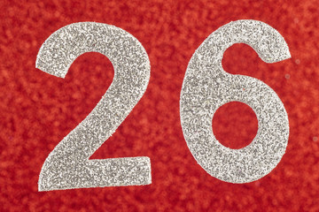 Number twenty-six silver color over a red background. Anniversary.