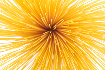 Uncooked pasta spaghetti macaroni, Top view, isolated on white background. A macro picture of a perfect spaghetti sphere.