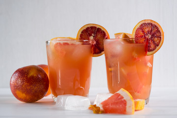 Detox  refreshing cocktail from grapefruit and sicilian orange with ice. Summer drink.