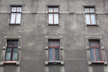The facade of the old house with windows