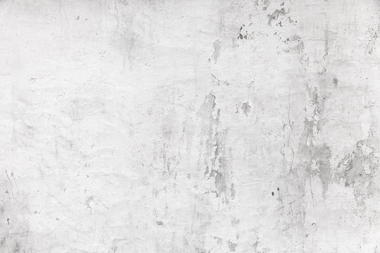 Old white concrete wall, grungy background