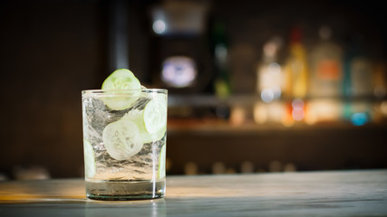 Gin tonic cocktail with cucumber.