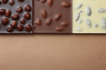 Black chocolate with hazelnuts, white and milk chocolate with almonds