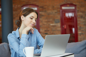 Young attractive woman looking away thoughtfully