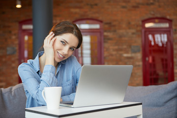 Young attractive woman looking away thoughtfully