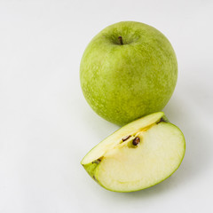 Green apples on white isolated background