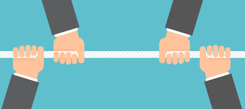 Business competition concept. Hands holding and pulling a rope