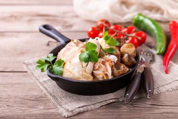 Chicken fillet, cabbage and mushrooms lunch. Selective focus. Copy space.