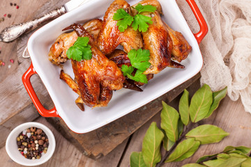 The baked chicken wings. Selective focus. Top view.