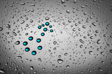 Gender symbol made out of water drops