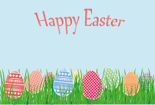 Easter decorative colorful eggs in the grass. Greeting card for the holiday. Free space for text.