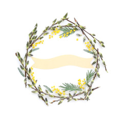 Pussy-willow branches with mimosa circle frame. Decorative wreath on white background perfect for...
