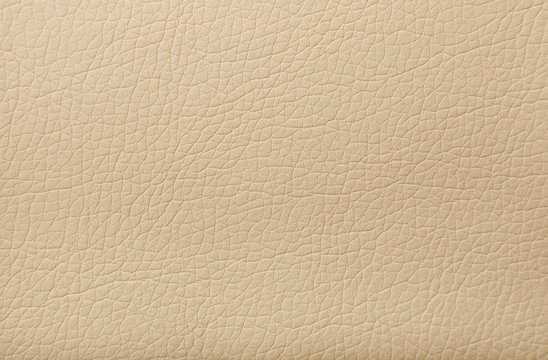 Soft beige leather texture with print as background