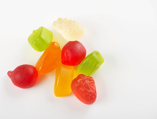 Sweets of various flavors and colors. Isolated. Horizontal shoot.