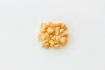 Natural aromatic incense Frankincense Siam resin isolated on a white background