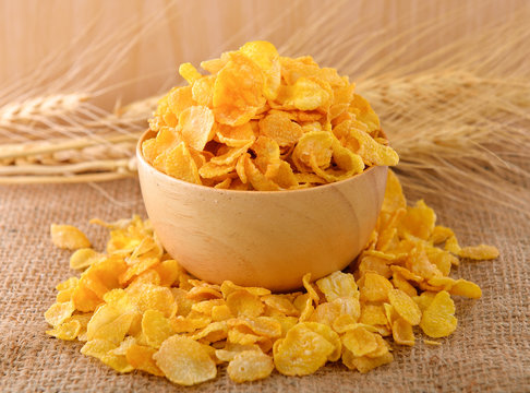 Cornflakes Cereal On Wooden Background