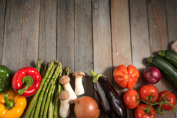 Fresh colorful vegetables on rustic wooden table