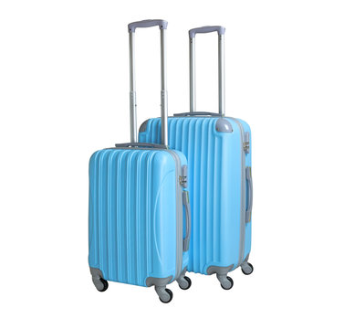 Two suitcases isolated on white background. Polycarbonate suitcases isolated on white. Blue suitcases.